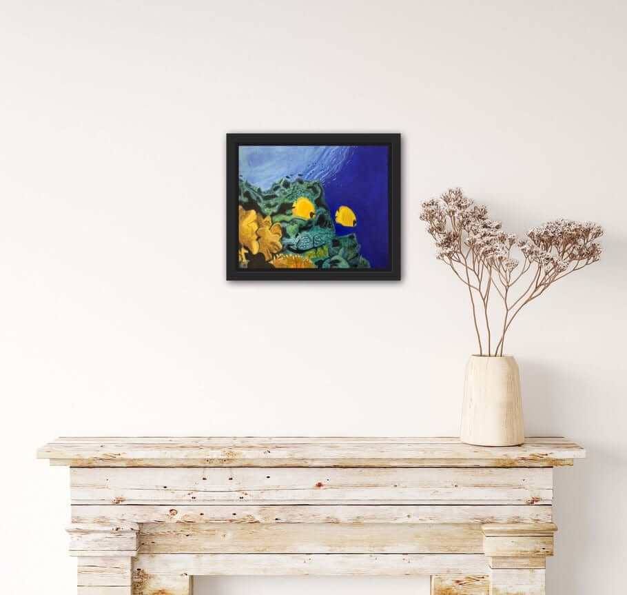 Butterfly fish and coral reef acrylic painting by S Valenti framed in black on wall