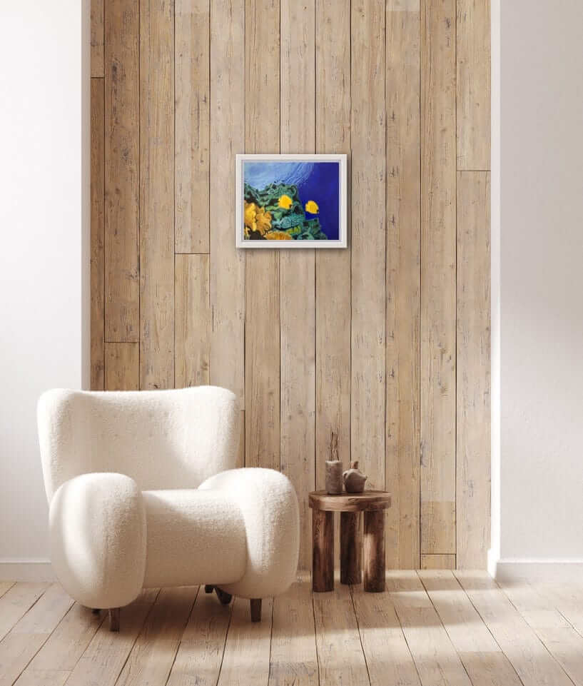 Butterfly fish and coral reef acrylic painting by S Valenti framed in white on wall